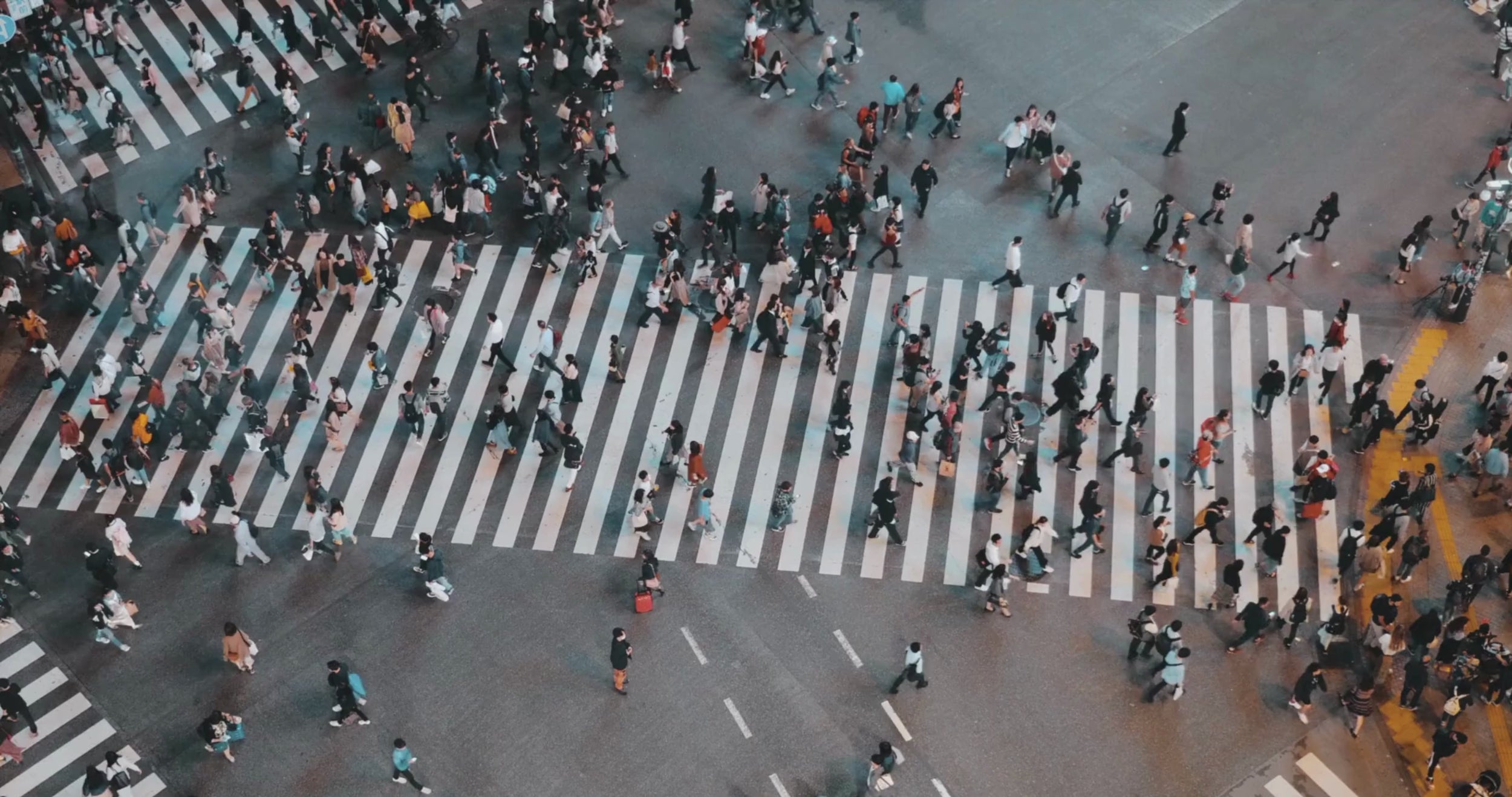 People walking and crossing each other